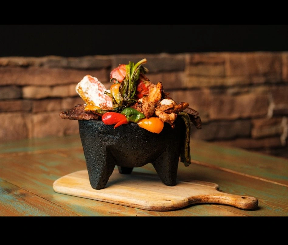 Delicious Original Molcajete Flameado at The Amigos in Edmonton, AB